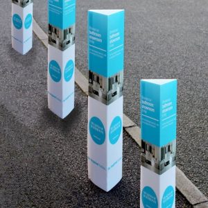 Custom-designed bollard sleeves featuring company logos for brand promotion.